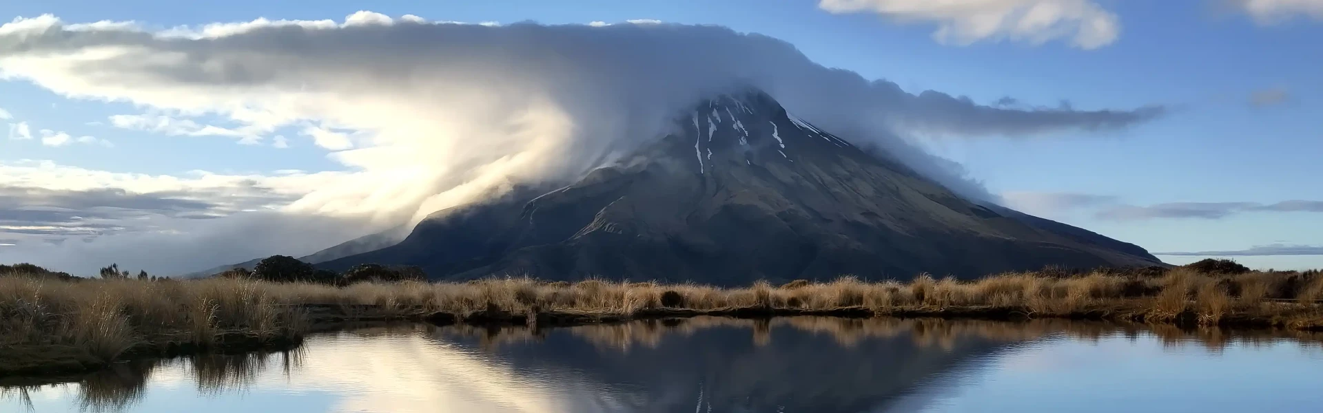 Image de fond qui montre un paysage du pays Nouvelle-Zélande